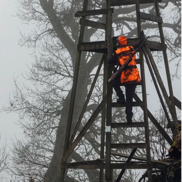 chaleco de caza naranja de alta seguridad repelente al agua para la mujer cazadora